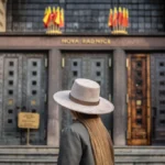 woman wearing handcrafted hat in Prague