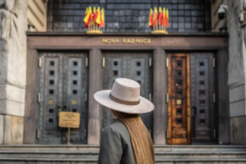 woman wearing handcrafted hat in Prague