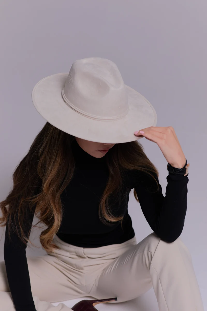 woman wearing handcrafted hat