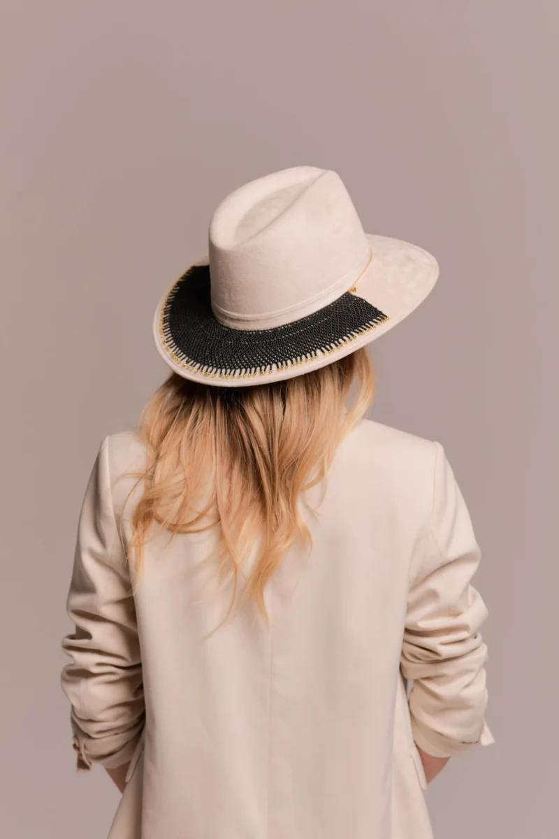 woman wearing hat and hat accessory