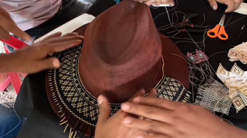 The Embera Chami Tribe creating a handcrafted hat accessory